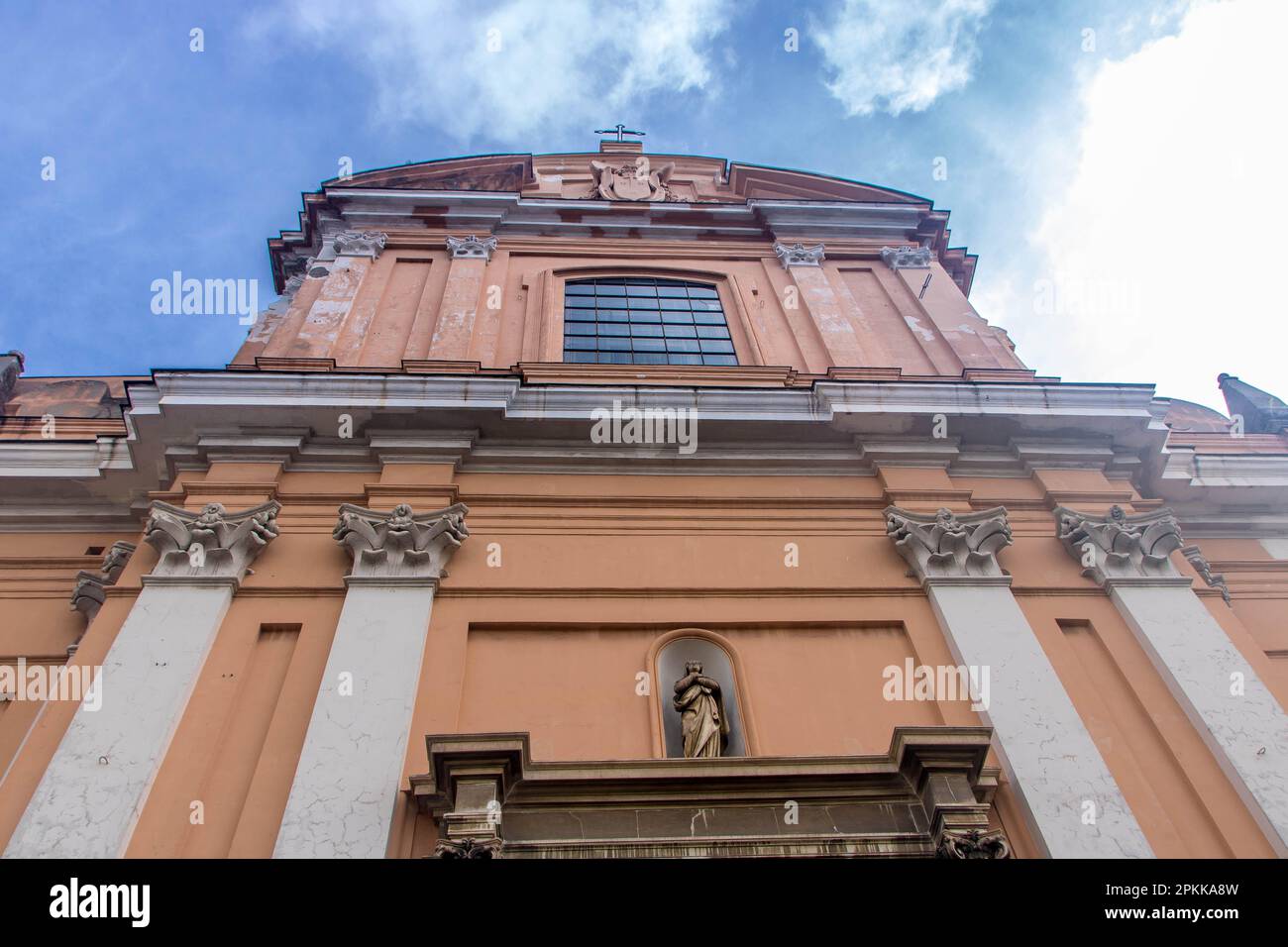 Facade of Santa Teresa degli Scalzi church in the historic center of Naples, Italy Stock Photo