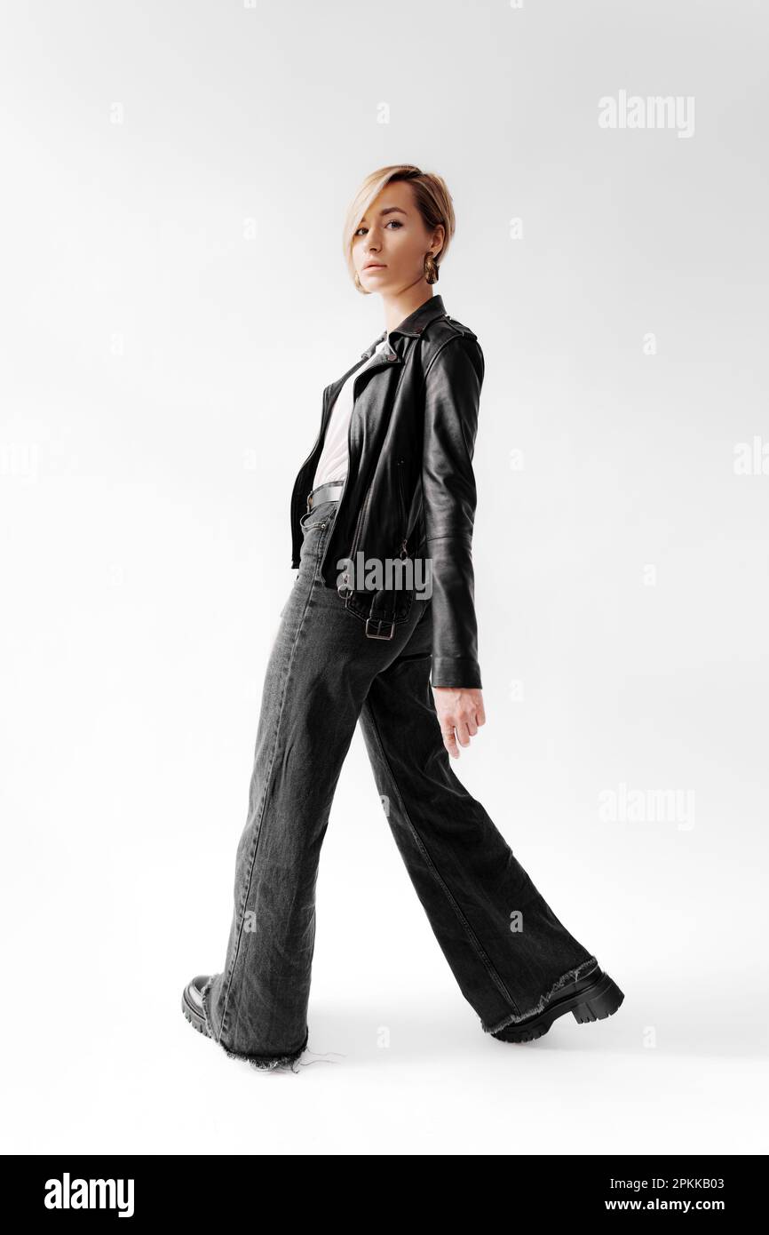 Slender woman in white leather hi-res stock photography and images - Alamy