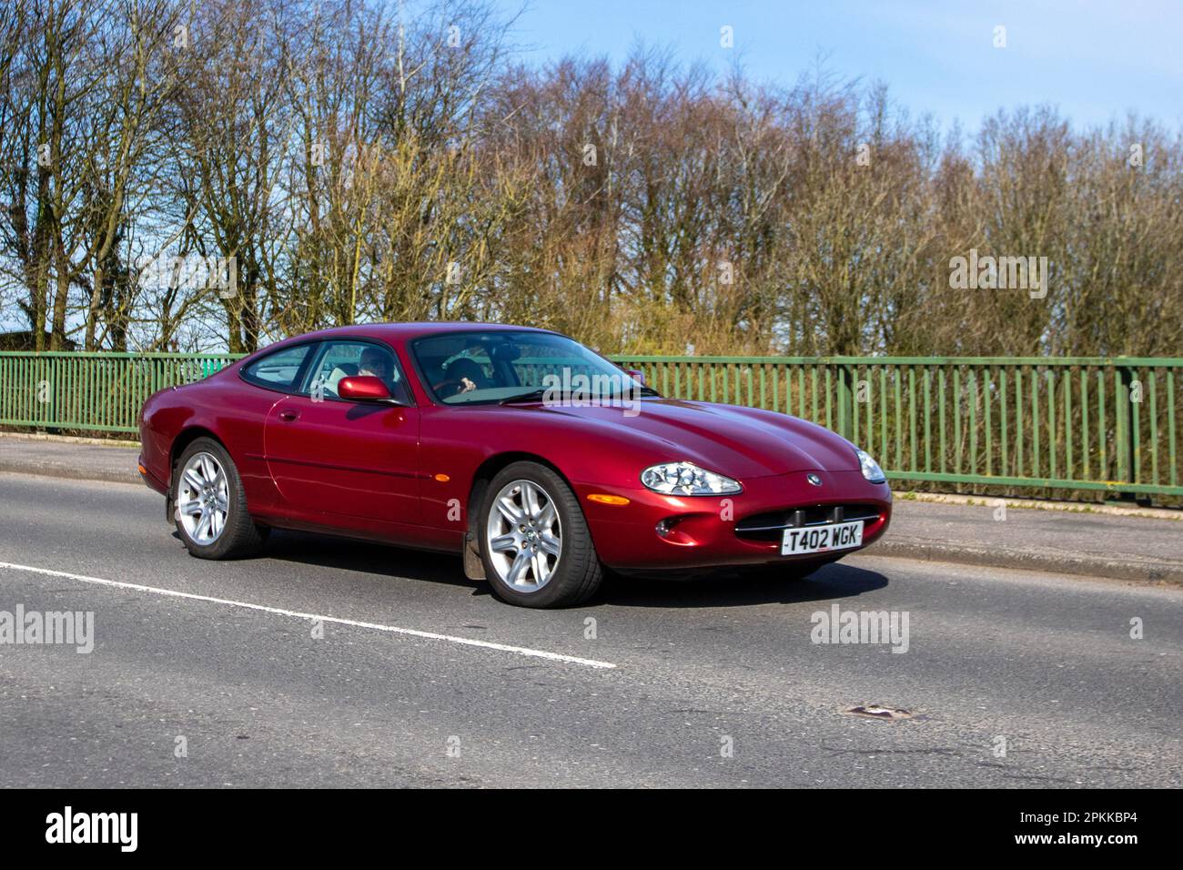 1999 90s nineties JAGUAR XK8 Coupe Auto; crossing motorway bridge in