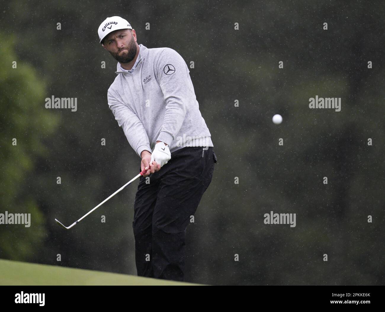 Jon Rahm kisses wife Kelley Cahill after winning 2023 Masters