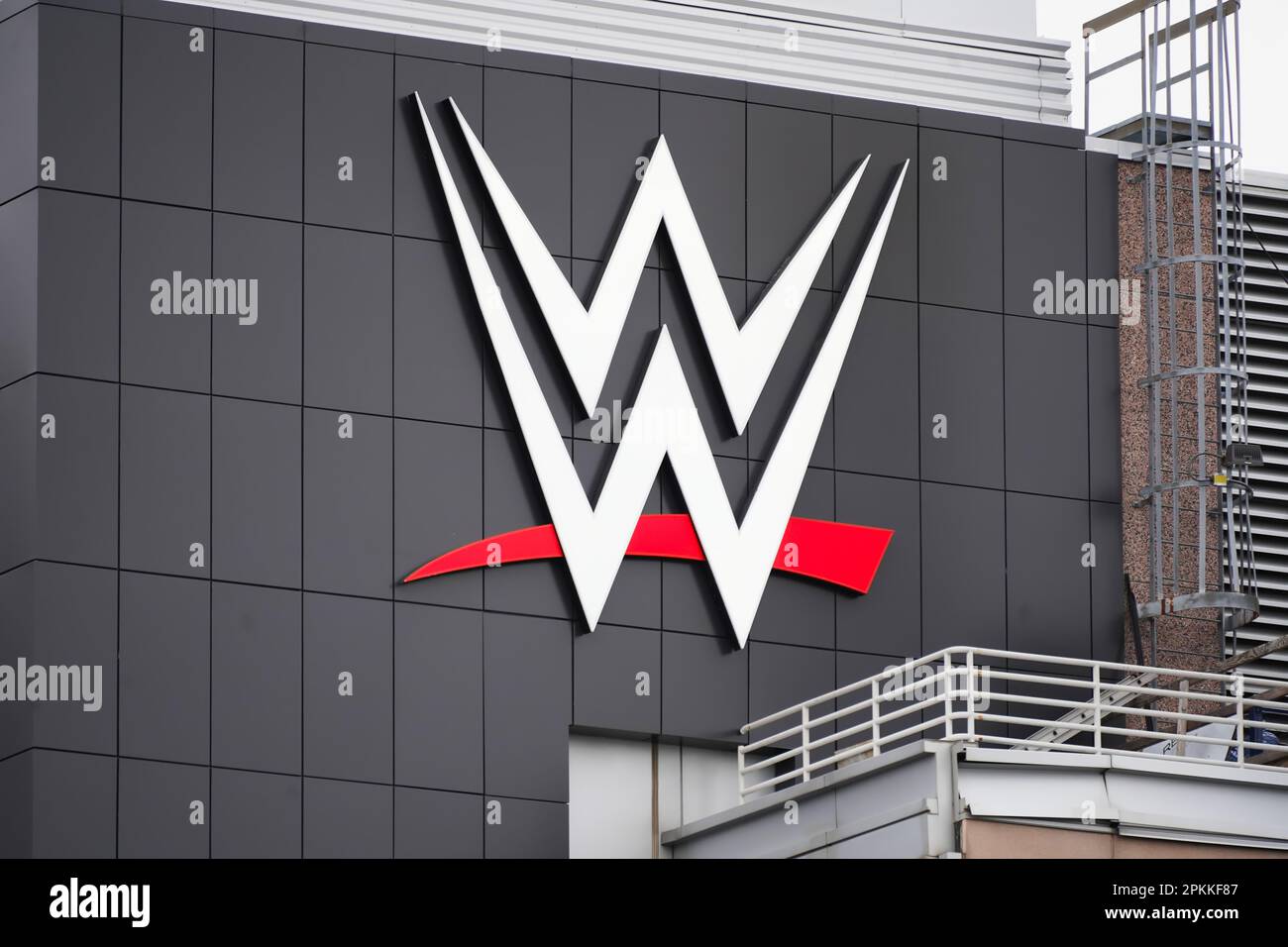 Stamford, CT - April 7, 2023 : World Wrestling Entertainment, Inc. also known as WWE logo on corporate headquarters building in Connecticut Stock Photo