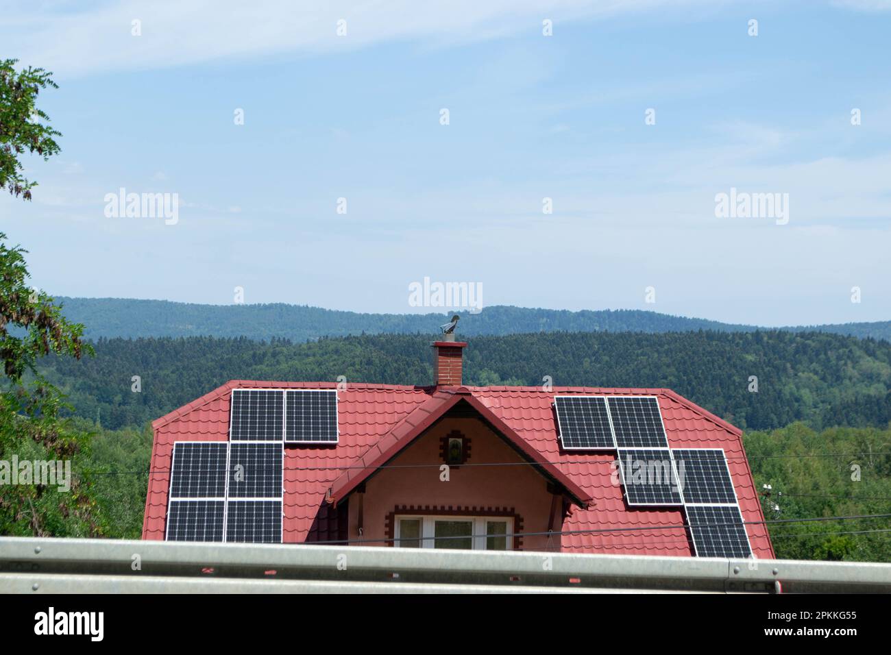 Image showcasing Historic farm house with modern solar panels on roof and wall High ...