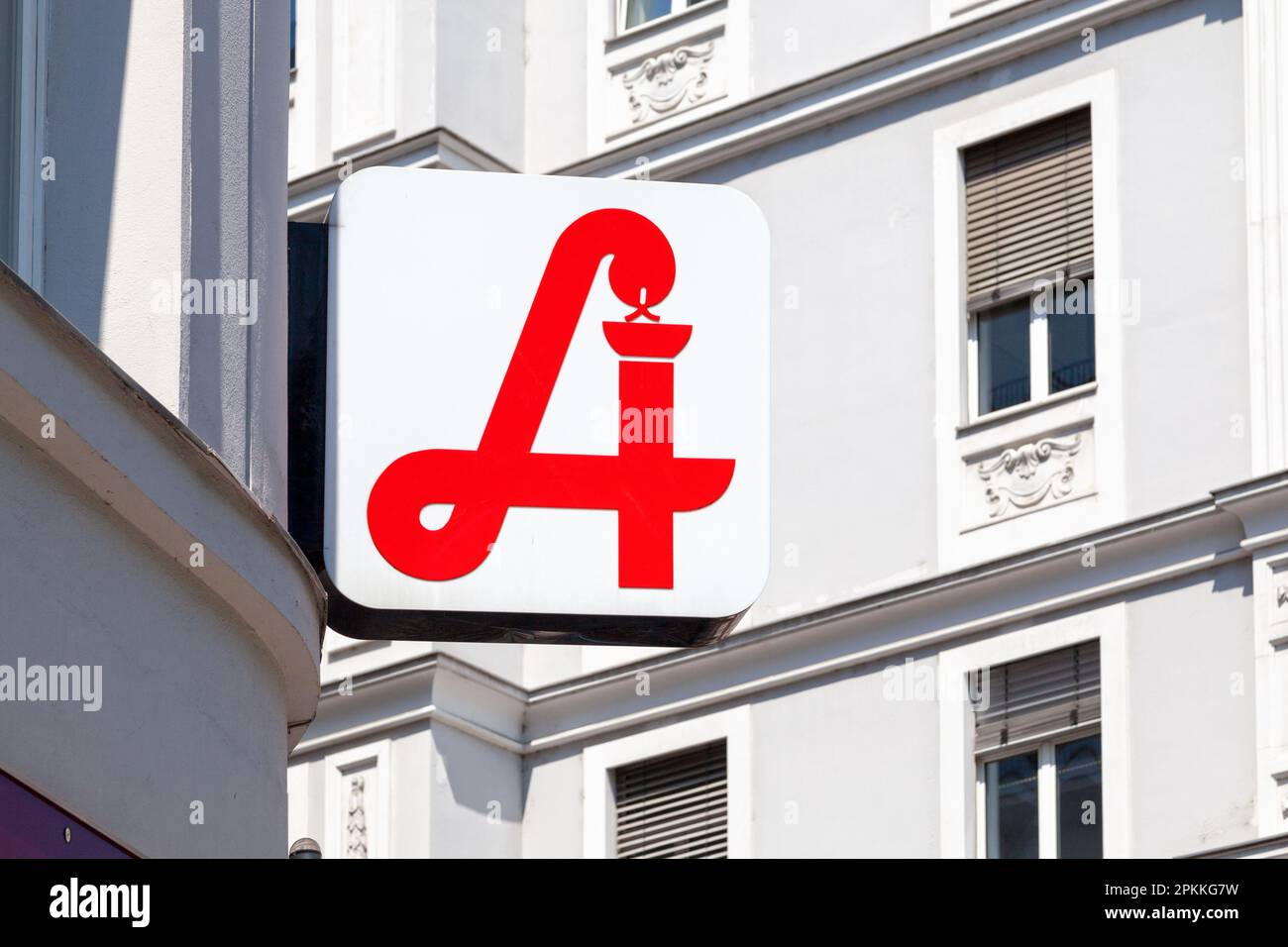 Austrian pharmacy displaying the traditional pharmacy sign used in the country. Stock Photo