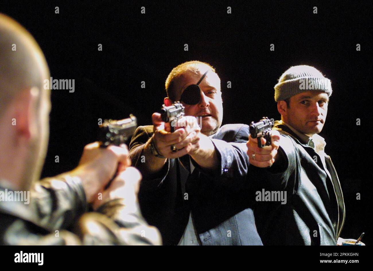 l-r: Glenn Chapman (Joey), Colin Mace (Christy), Stuart Goodwin (Robbie) in THE LIEUTENANT OF INISHMORE by Martin McDonagh at the Royal Shakespeare Company (RSC), The Other Place, Stratford-upon-Avon, England  11/05/2001 design: Francis O'Connor  lighting: Tim Mitchell  director: Wilson Milam Stock Photo