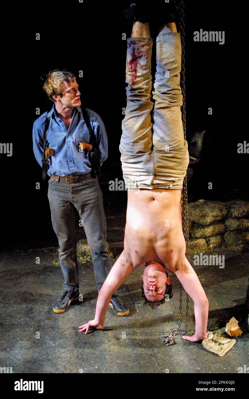 l-r: David Wilmot (Padraic), Conor Maloney (James) in THE LIEUTENANT OF INISHMORE by Martin McDonagh at the Royal Shakespeare Company (RSC), The Other Place, Stratford-upon-Avon, England  11/05/2001 design: Francis O'Connor  lighting: Tim Mitchell  director: Wilson Milam Stock Photo