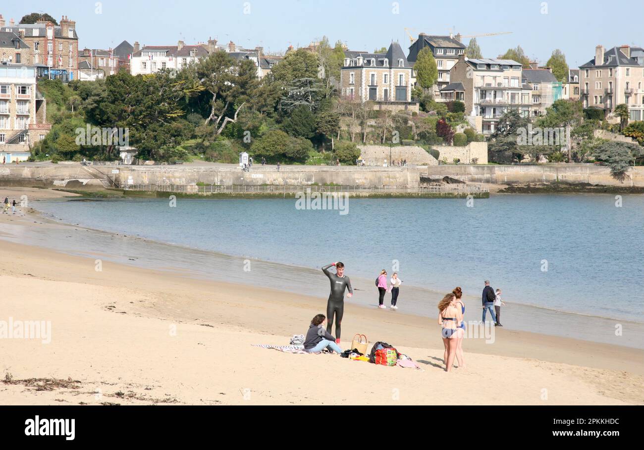 Bathers getting ready for an early morning swim at the Plage du Prieure, Dinard, North West France, Europe Stock Photo