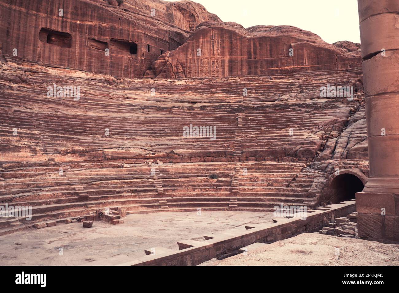 Nabatean theatre carved out solid rock of the mountains, Petra, UNESCO World Heritage Site, Jordan, Middle East Stock Photo