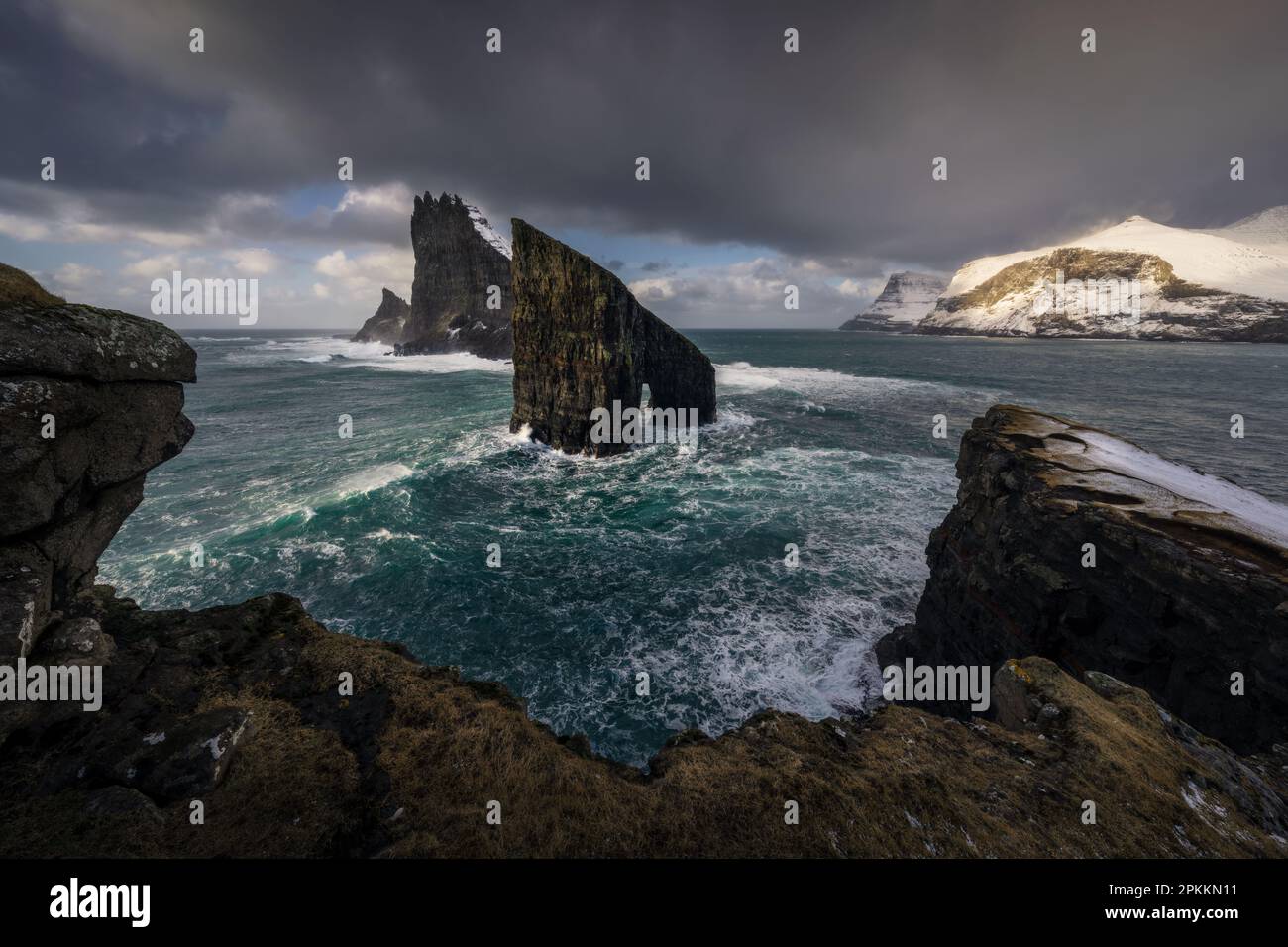 The Arch of Drangarnir in the middle of Atlantic Ocean, the epic