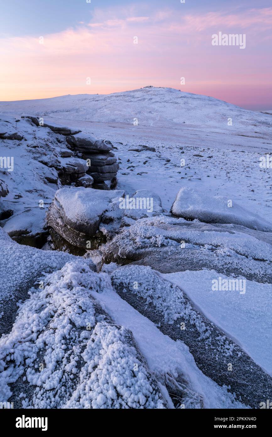 Snow and ice covered moorland at dawn on West Mill Tor in Dartmoor National Park in winter, Devon, England, United Kingdom, Europe Stock Photo