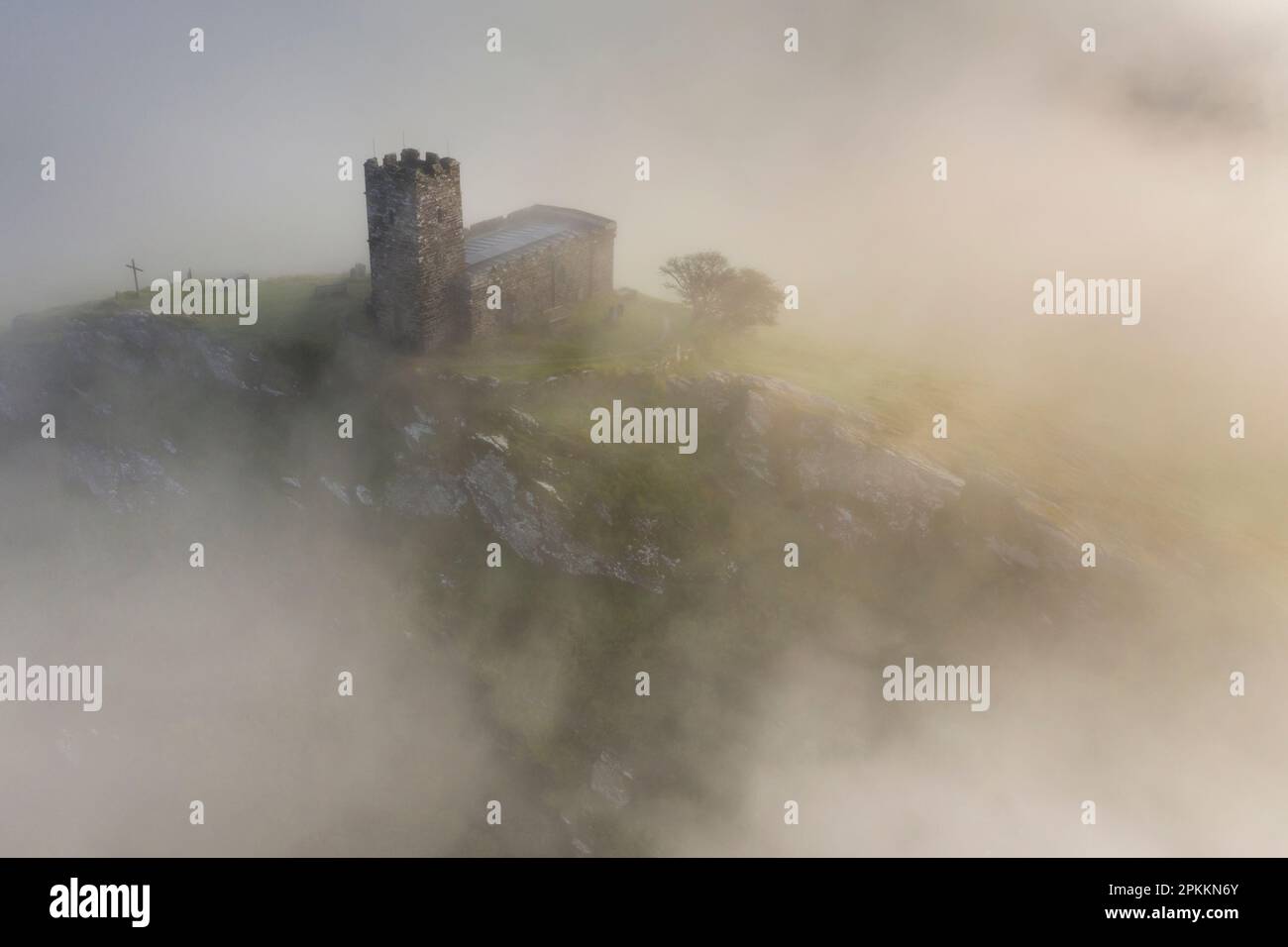 St. Michael de Rupe Church on the summit of Brentor on a misty September morning, Dartmoor, Devon, England, United Kingdom, Europe Stock Photo