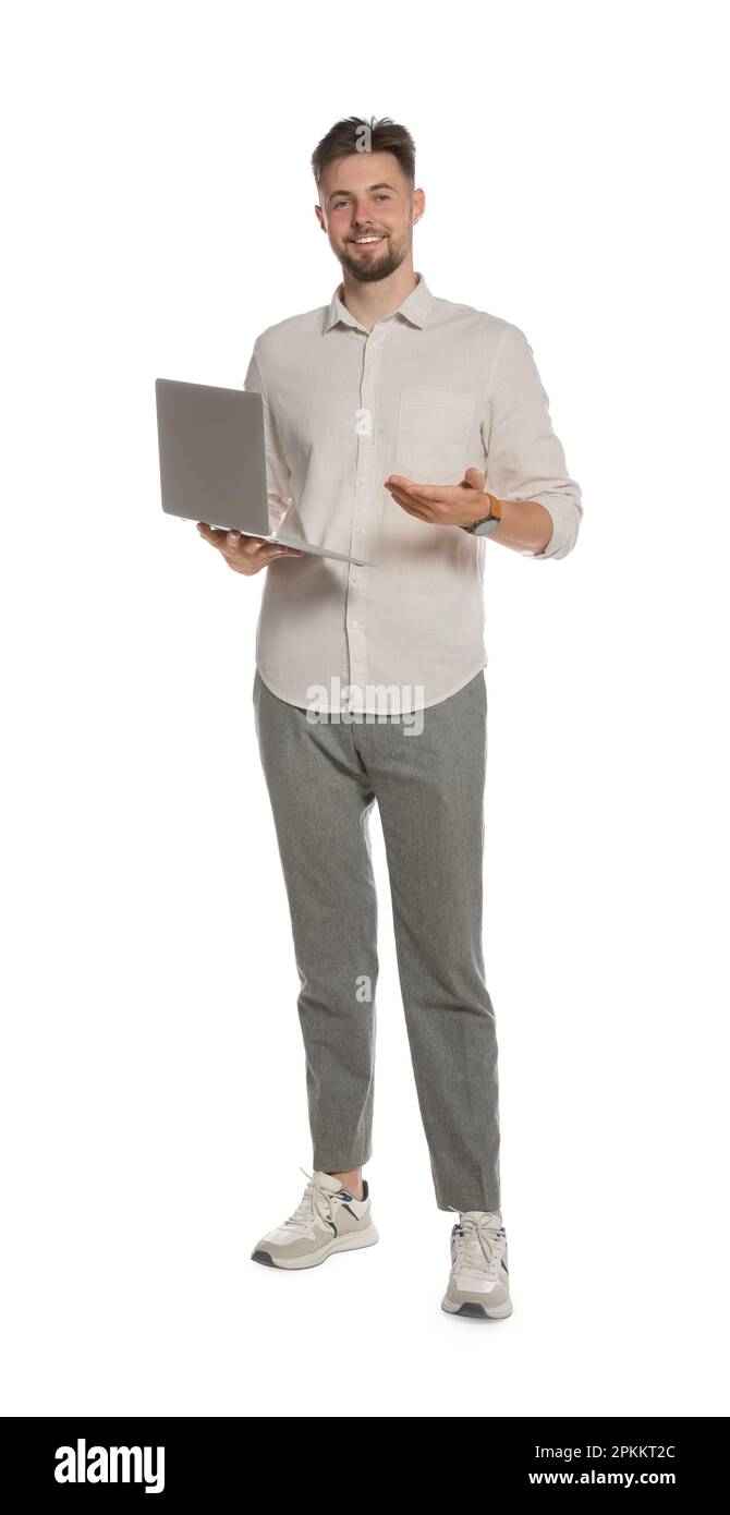 Handsome man working with laptop on white background Stock Photo - Alamy