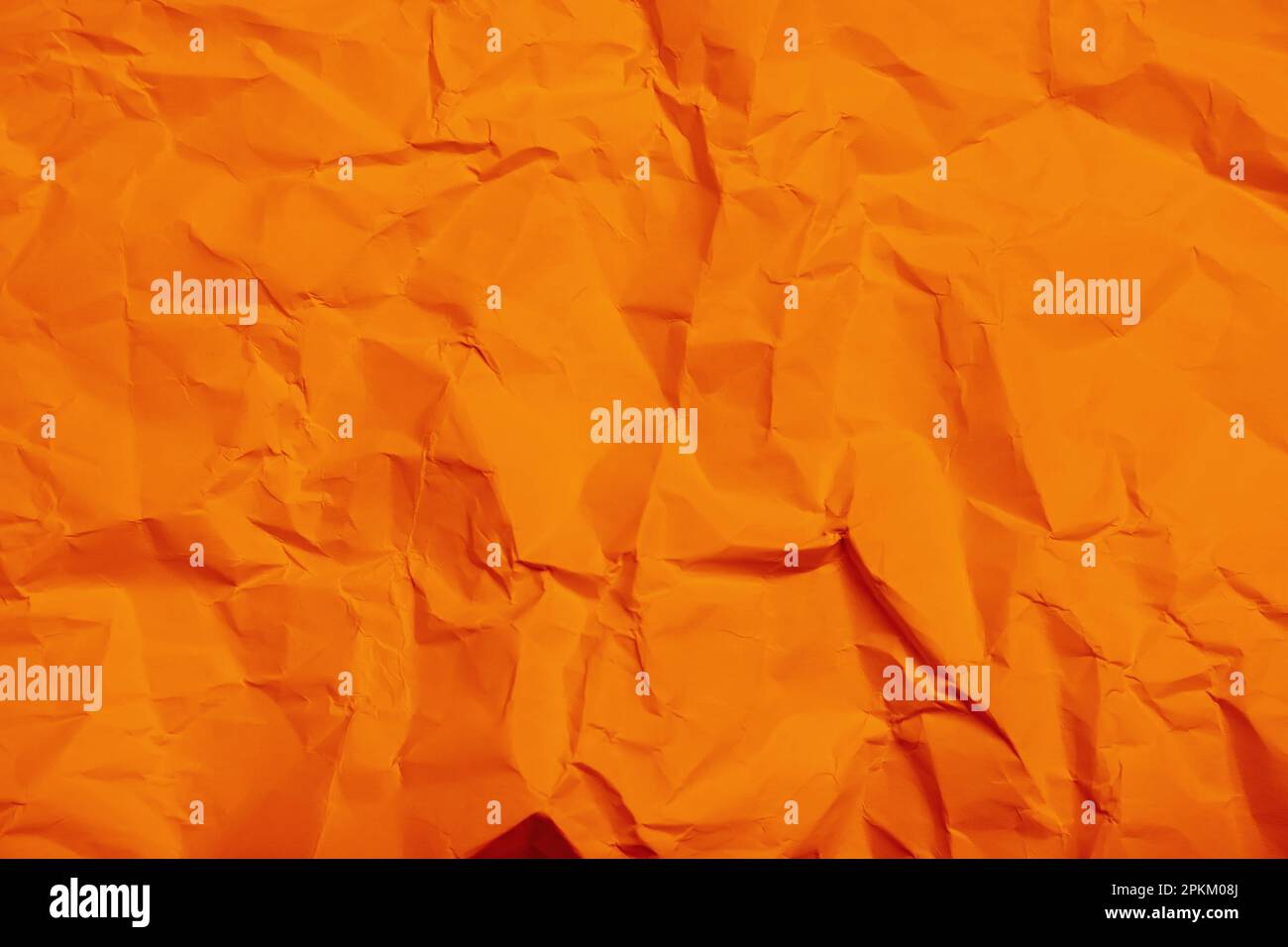 Sheet of orange crumpled paper as background, closeup Stock Photo - Alamy