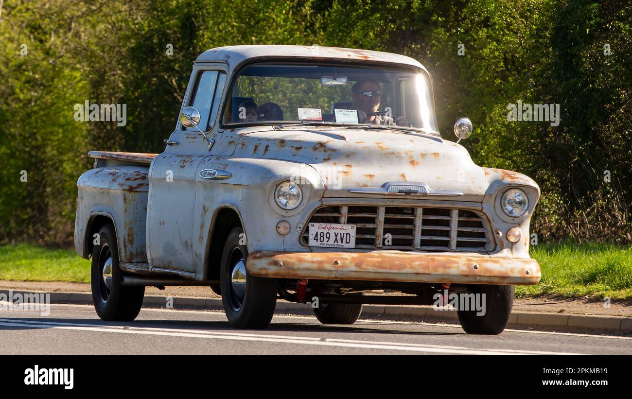 1957 CHEVROLET pick up truck travelling on an English country road Stock Photo
