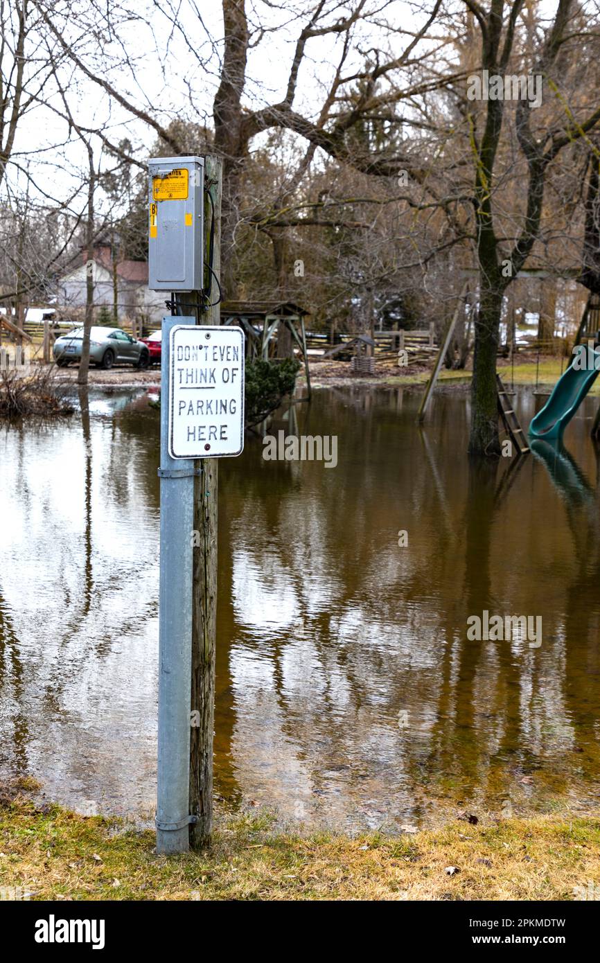 Flooded playground with no parking sign Stock Photo - Alamy