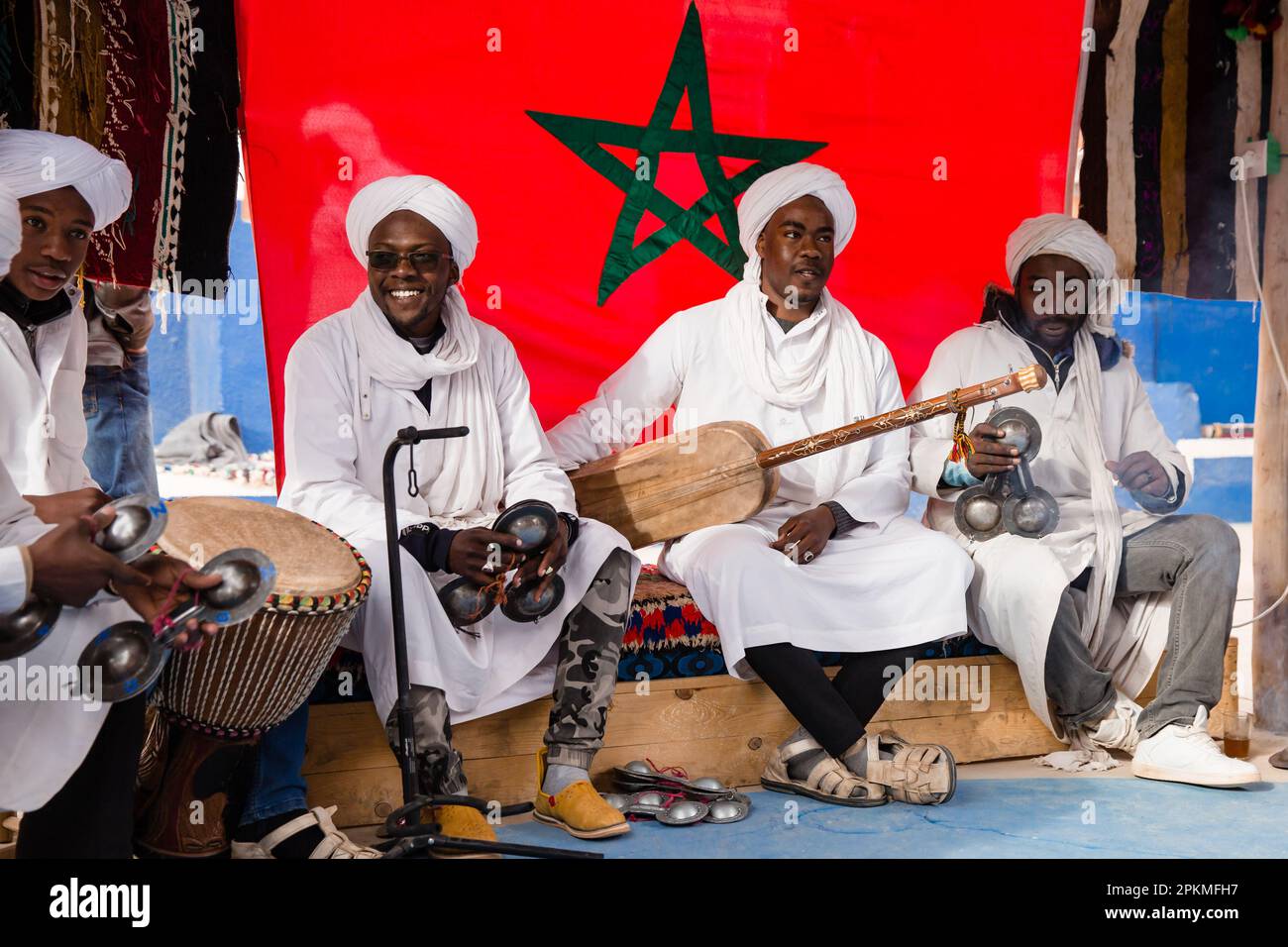 A group of Moroccan men perform music at Dar Gnaoua Bambara Khamlia