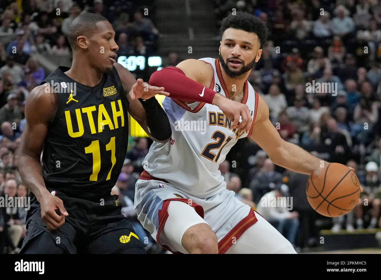 Utah Jazz guard Kris Dunn (11) defends against Denver Nuggets guard