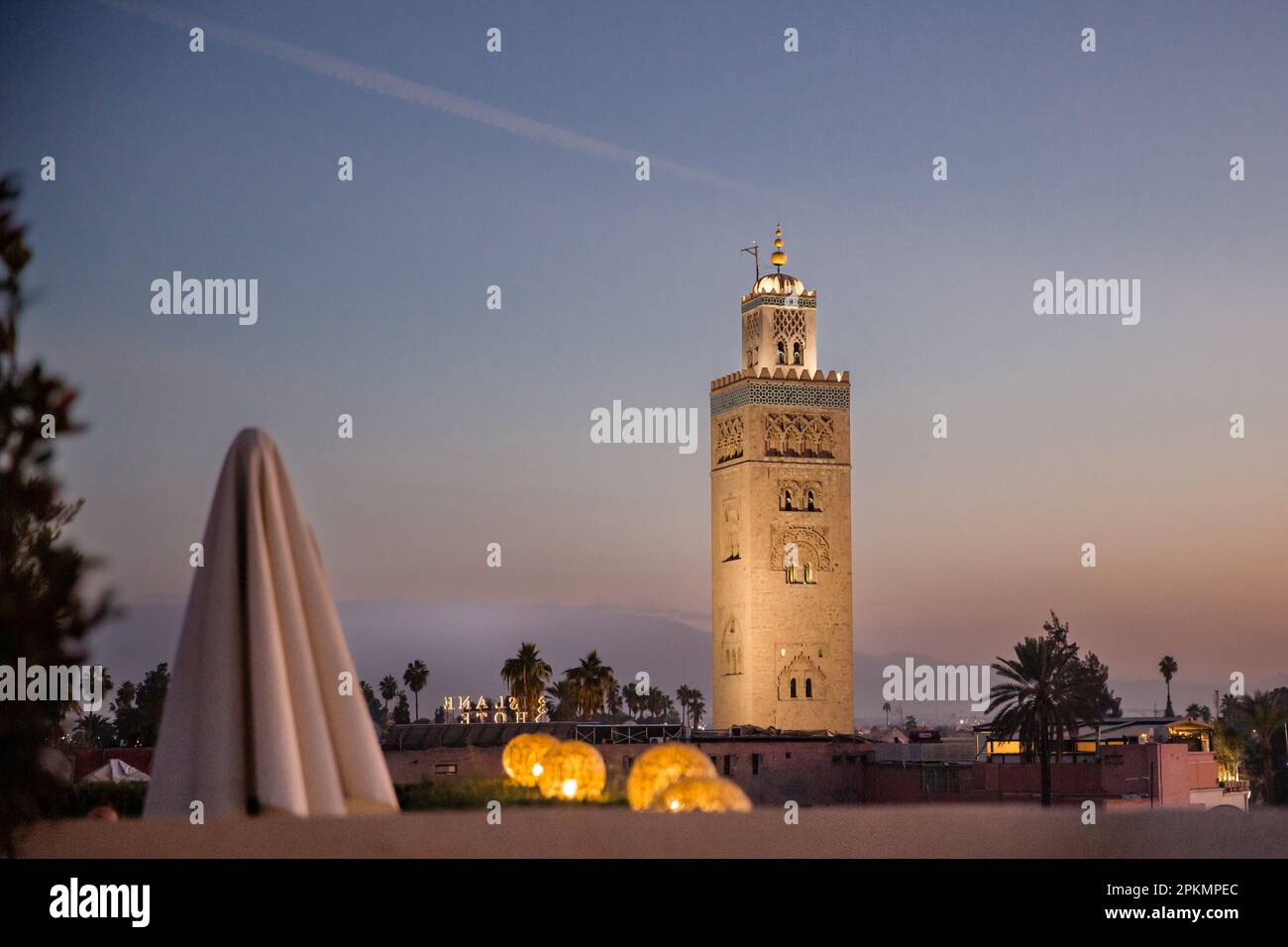 Evening view of the Koutoubia Mosque from the rooftop bar of El Fenn hotel in Marrakech Morocco Stock Photo