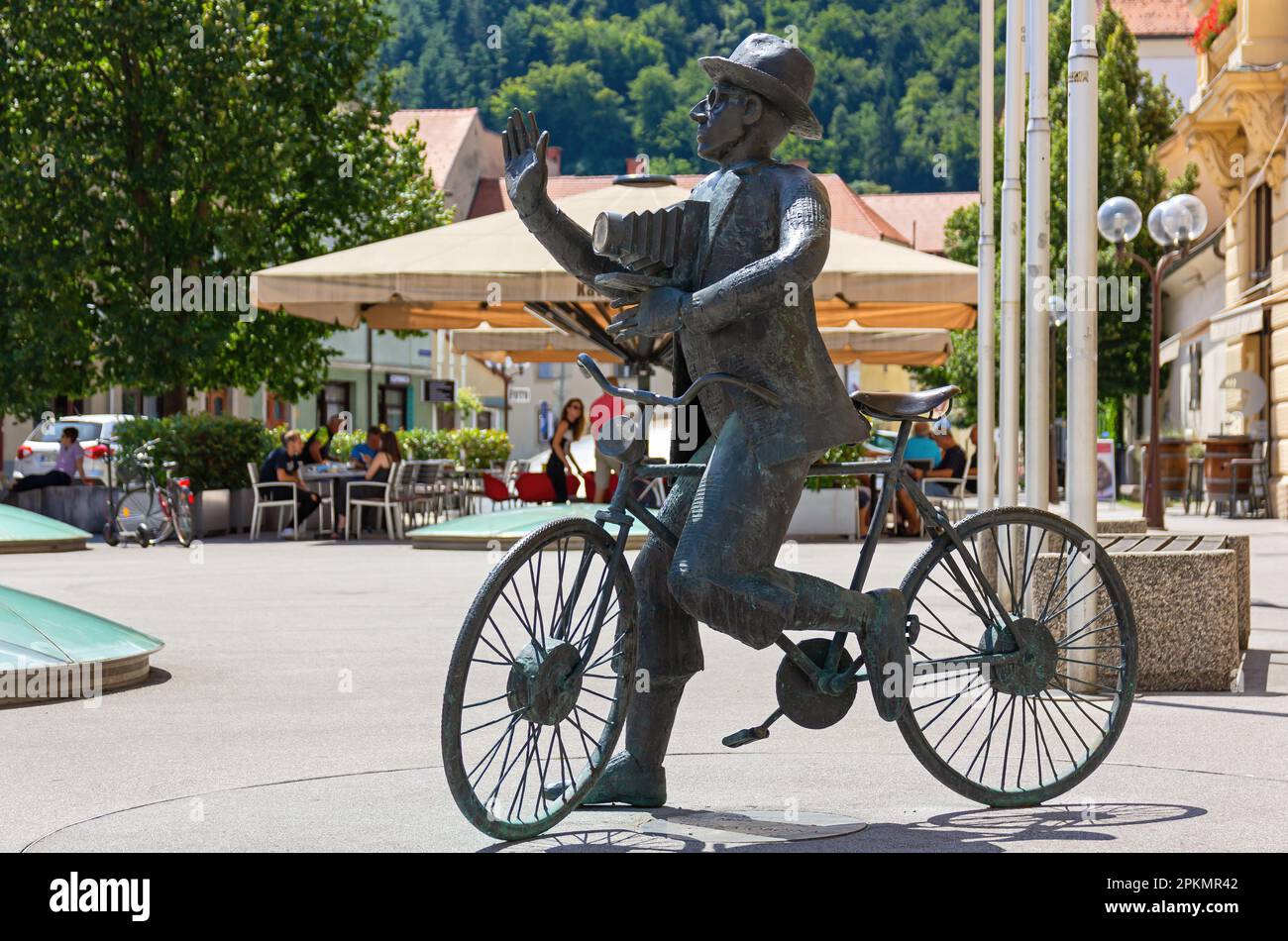CELJE, Slovenia - August 1, 2019: Bronze statue of famous slovenian photographer of Czech origins Josip Pelikan in front of the town hall Stock Photo