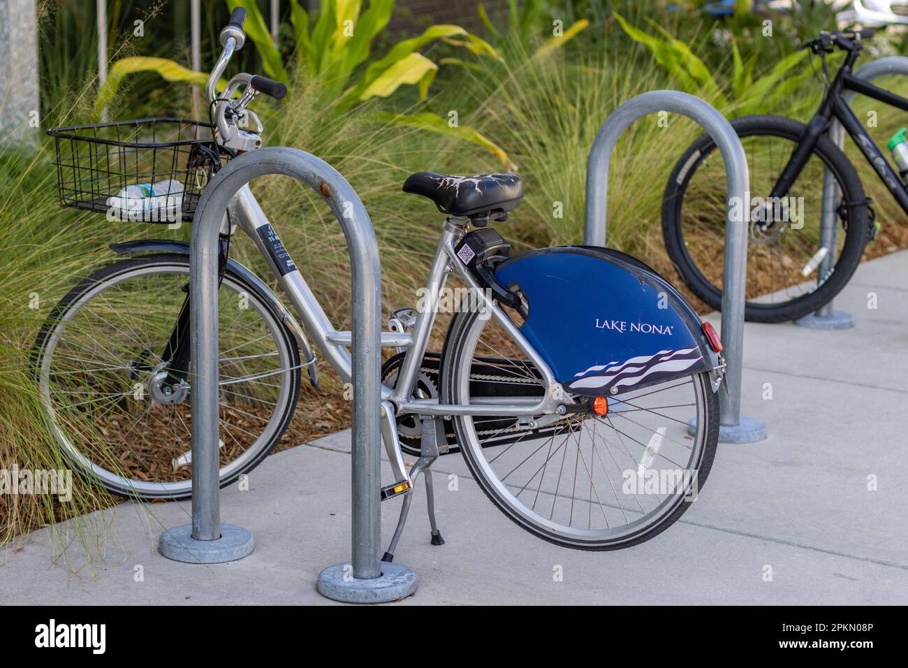 Lake Nona City bike parked at the bicycle parking station. Taken in the Lake Nona area, Florida. Stock Photo