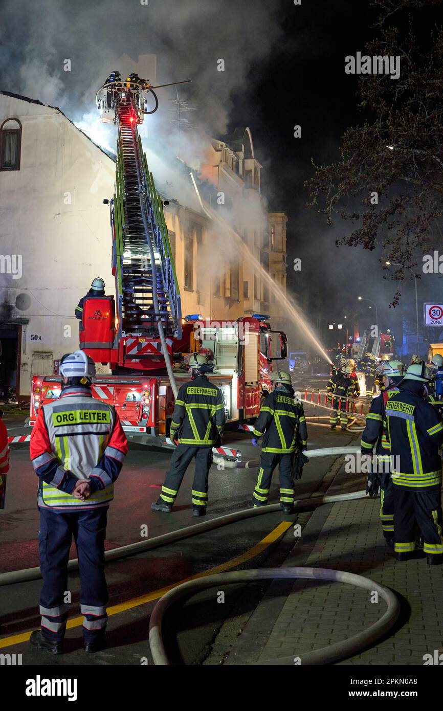 Koblenz, Germany. 08th Apr, 2023. Firefighters fight the fire of two residential buildings in the Koblenz district of Pfaffendorf. The rescue service including emergency doctor treated two people with suspected smoke inhalation, said a statement from the fire department. Credit: Thomas Frey/dpa/Alamy Live News Stock Photo