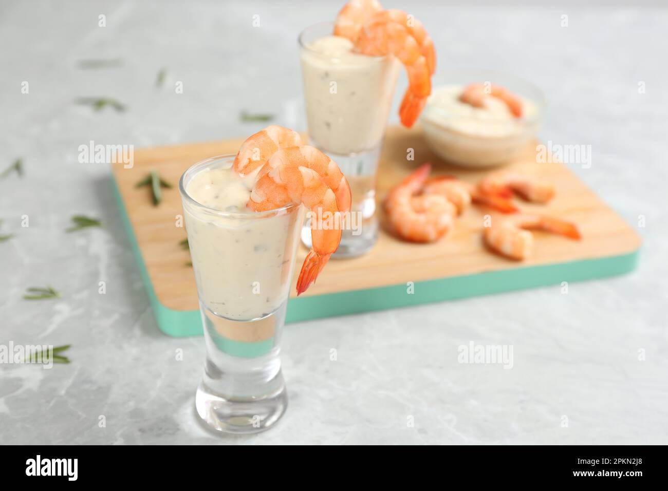 Shrimp cocktail and tartar sauce on marble table Stock Photo