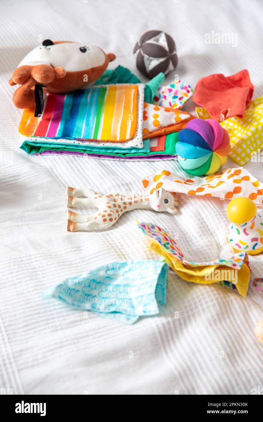 Messy room with baby toys everywhere, colourful, home concept Stock