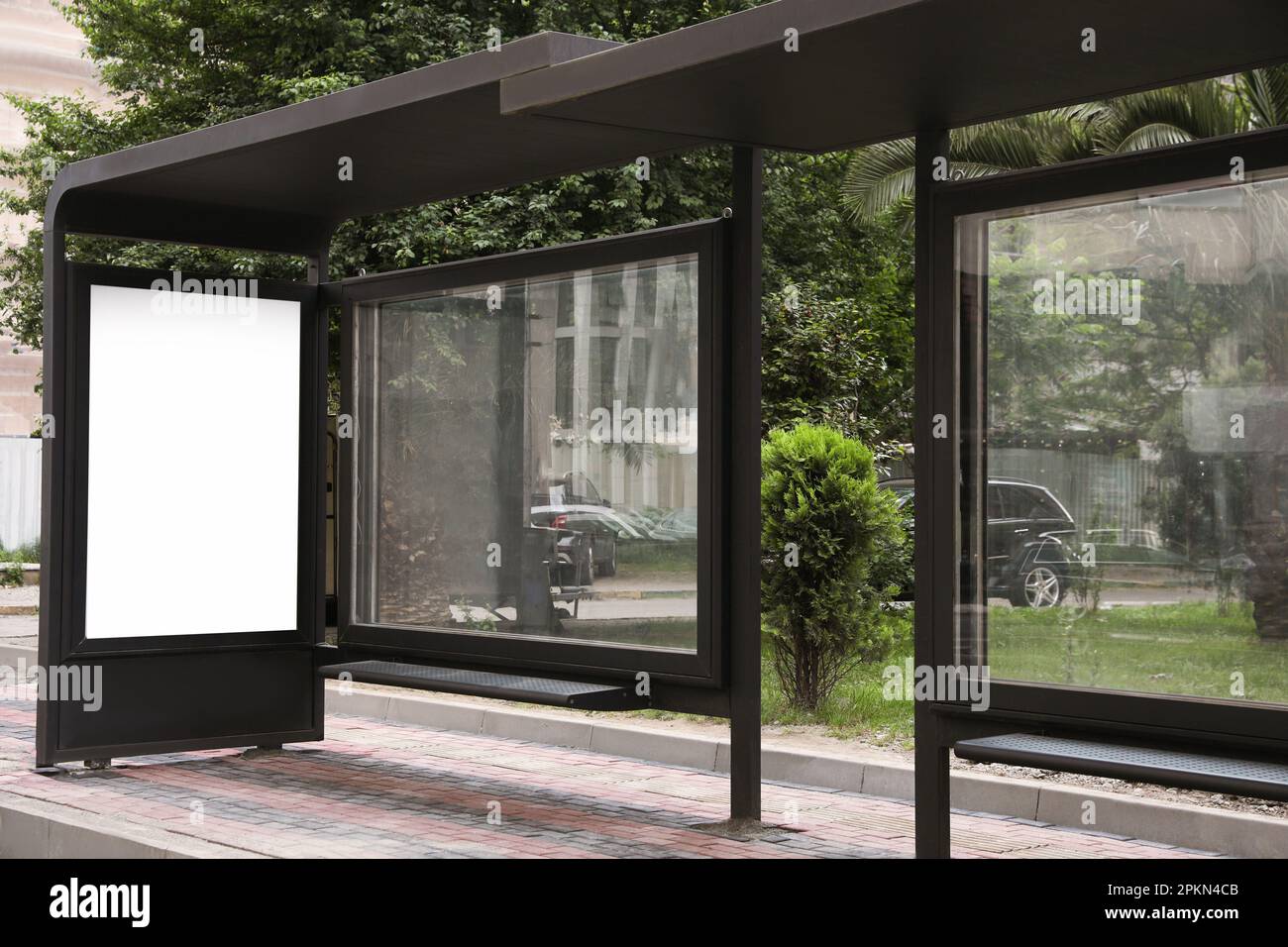 Blank advertising board on transport stop. Space for design Stock Photo ...
