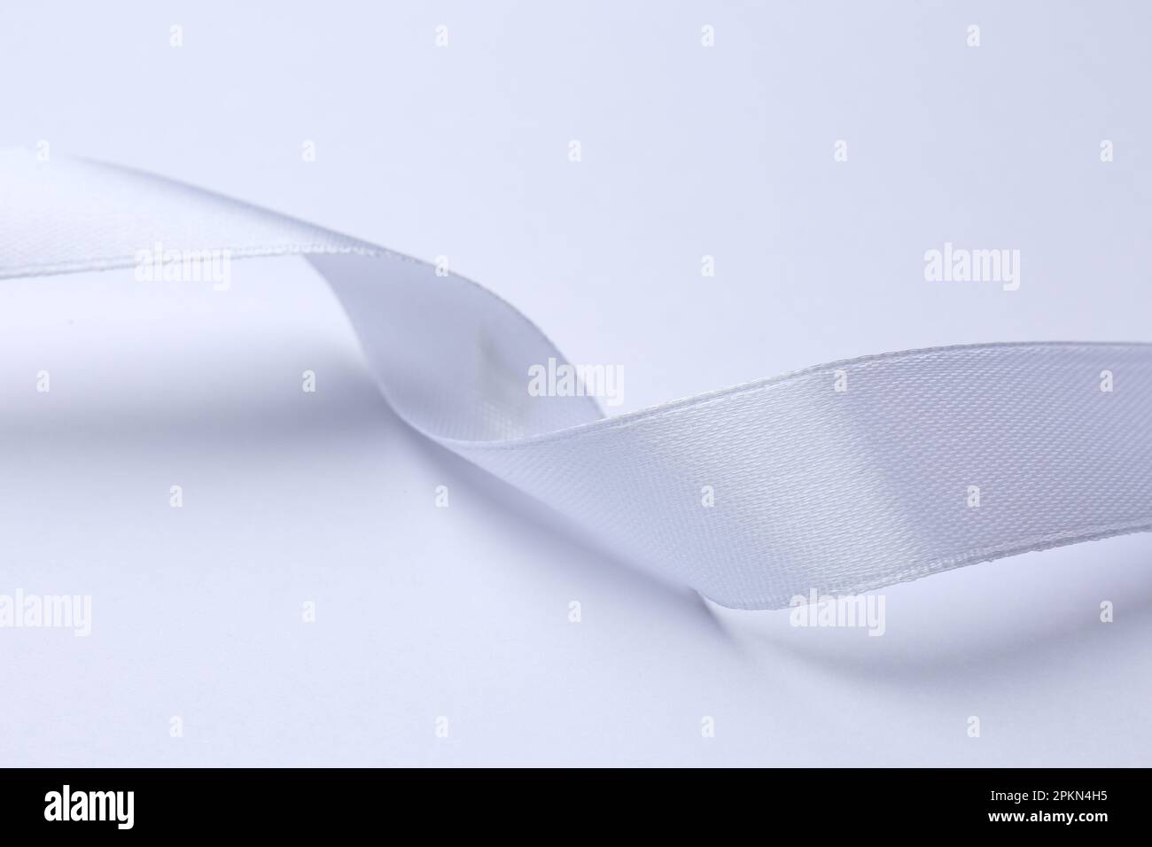 One beautiful silk ribbon on white background Stock Photo - Alamy