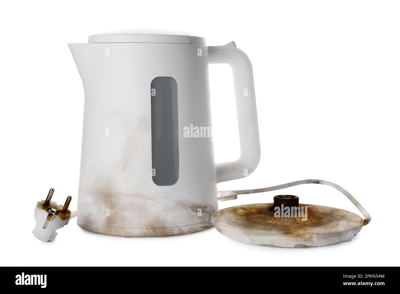 Burnt electric kettle with base and plug on white background Stock
