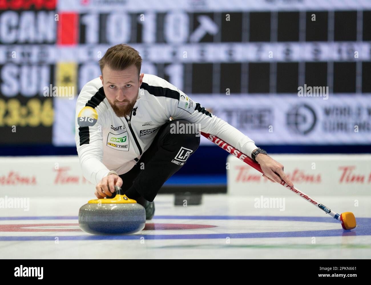 Swiss skip Yannick Schwaller makes a shot during semifinal action