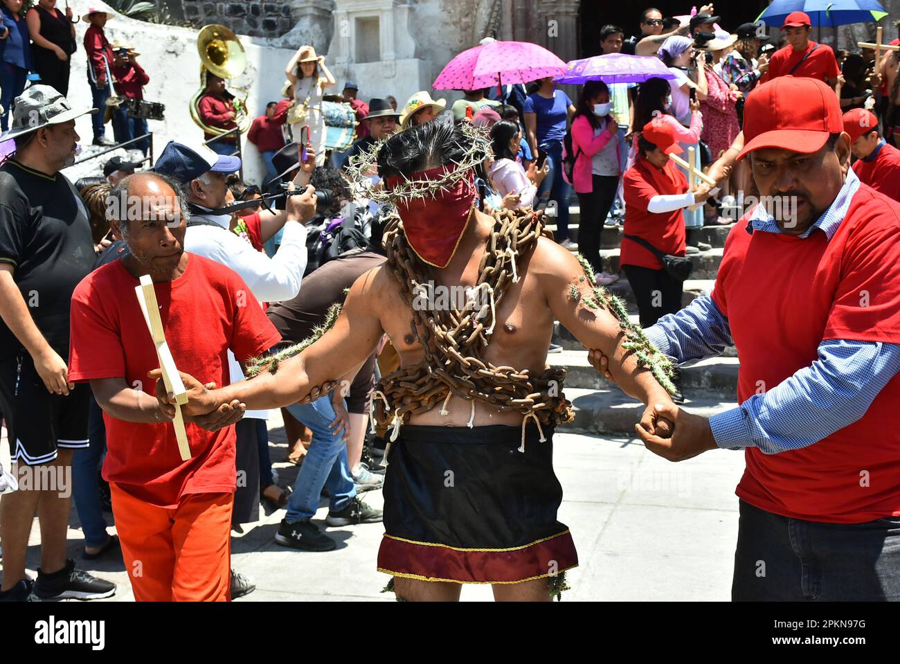 Atlixco, Mexico. 07th Apr, 2023. April 7, 2023, Atlixco, Mexico - Hooded  Penitents, wearing heavy chains and cactus spines stuck to their bodies,  take part in the Holy Week penitential procession The '