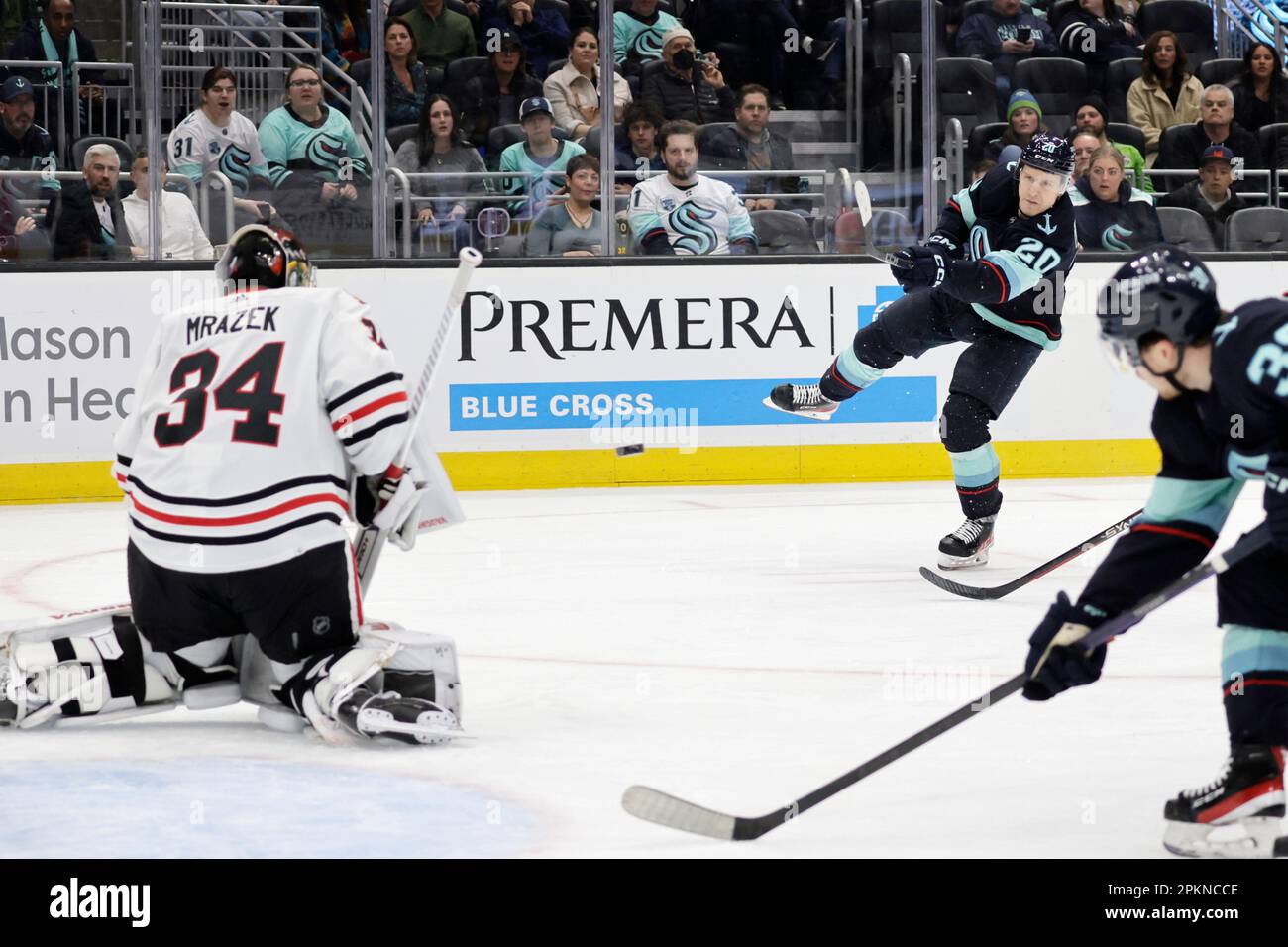 Seattle Kraken right wing Eeli Tolvanen (20) is congratulated after scoring  against the Vancouver Canucks during