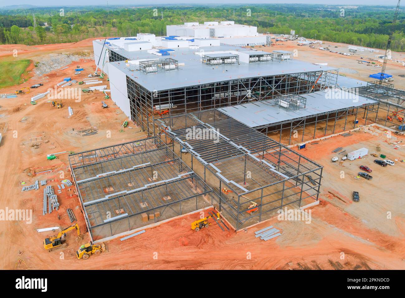 Steel truss frames are being constructed as part of construction an