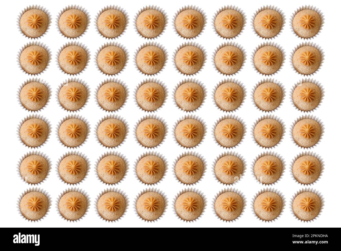 Several Brazilian fudge balls of churros arranged in a rectangular shape. Stock Photo