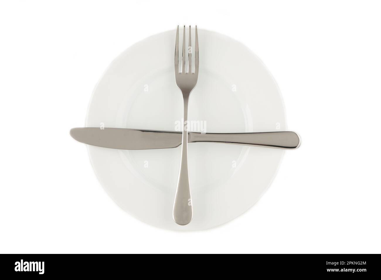 Ready for second plate. Dining etiquette. Table manner. Knife and fork sign. Set of foto 3 from 7. Top view Stock Photo