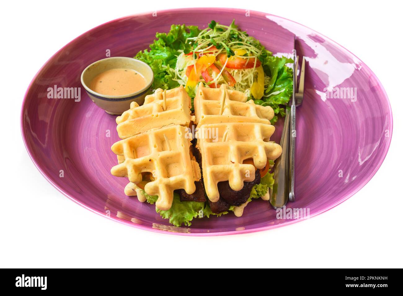 Belgian waffles Char siu pork with salad close up Stock Photo