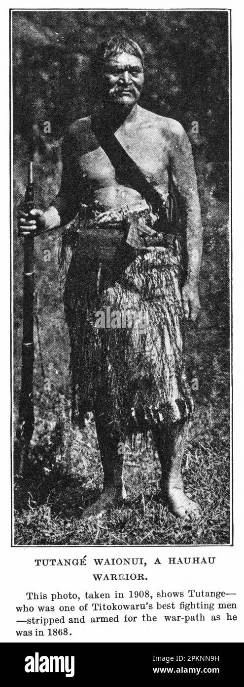 1908 Portrait of Tutange Waionui, a Hauhau warrior, posing in the clothes he wore when on the war-path in 1868 agains the New Zealand colonial government. Stock Photo