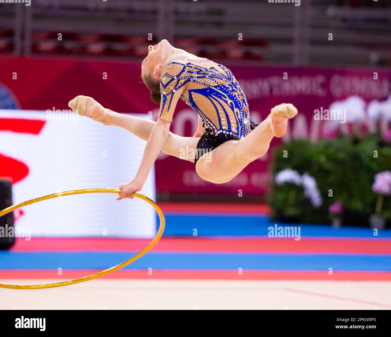 Sofia, Bulgaria. March 31, 2023. Milana Parfilova of Kazakhstan performs with the hoop during the Rhythmic Gymnastics World Cup at Arena Armeec Stock Photo