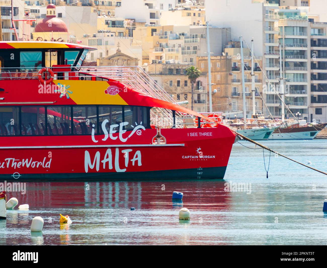Sliema, Malta - May, 2021: Tuoristic red ship 'hop on hop off' in the port of Sliema district. Sliema Ferry port. Malta. Europe Stock Photo