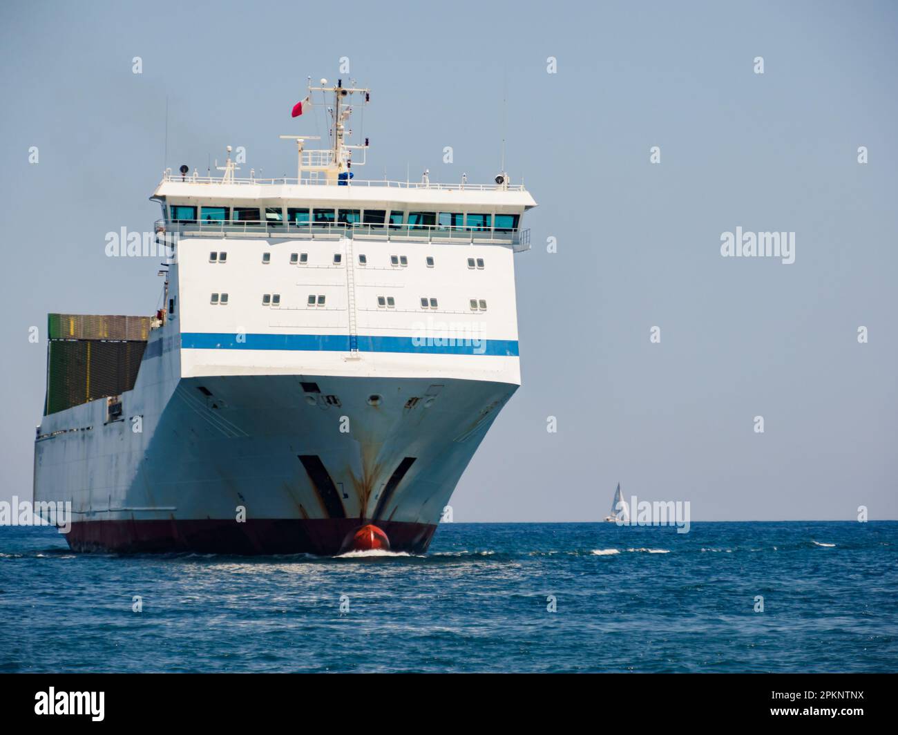 Valletta, Malta May 2021. A huge cargo ship enters the port of