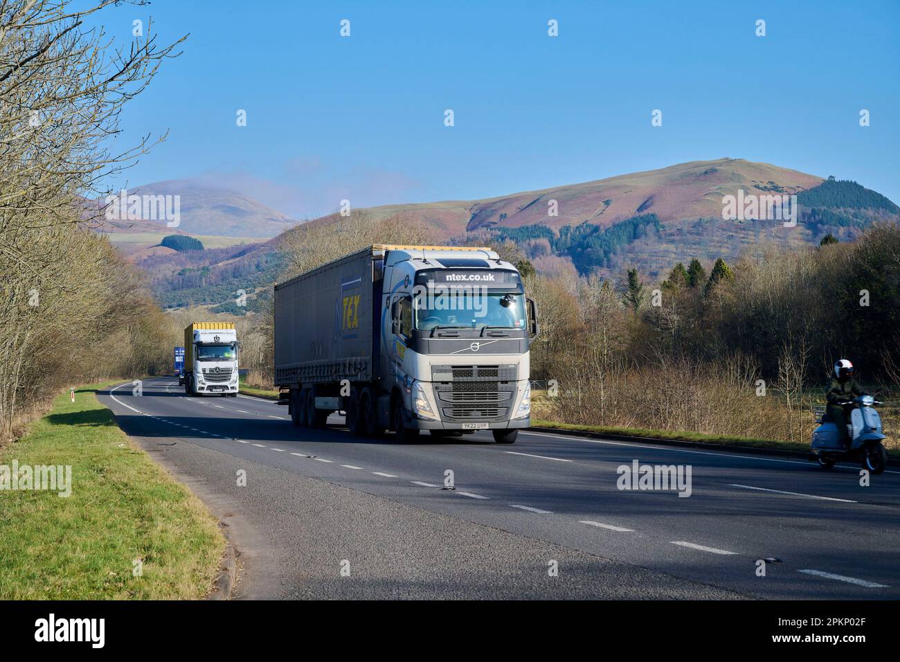 The busy A66 trunk road at Keswick, Lake District, UK Stock Photo