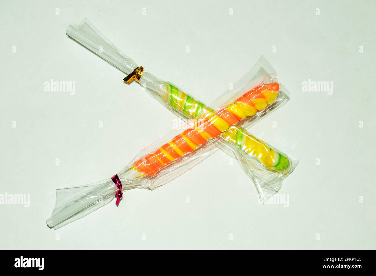 This milk chocolate lollipop multi-color sugar-coated candies offers ...