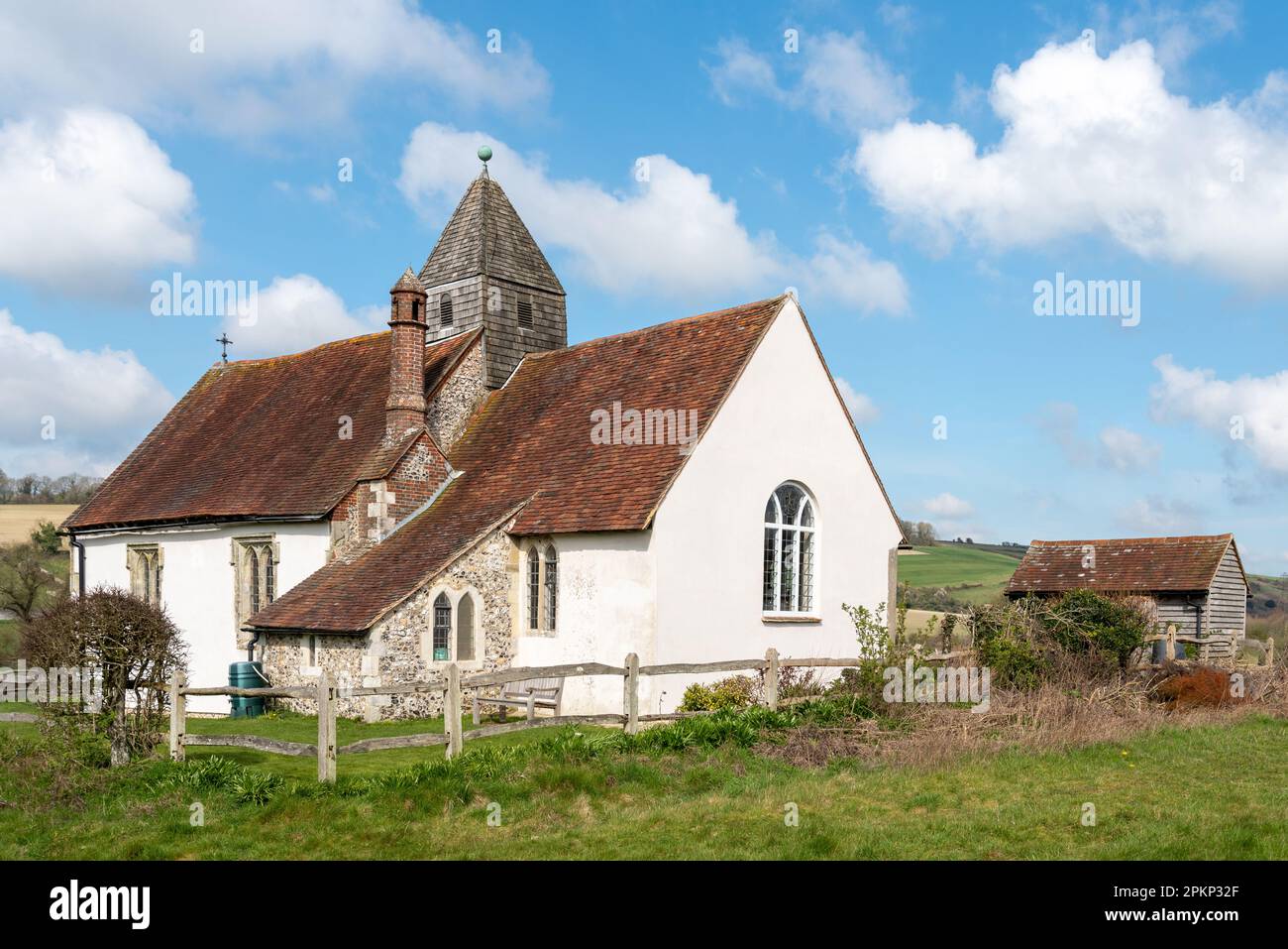St Hubert’s Church in Idsworth, Hampshire, England. An 11th century Anglican church standing alone in the English countryside.  April 8th 2023. Stock Photo