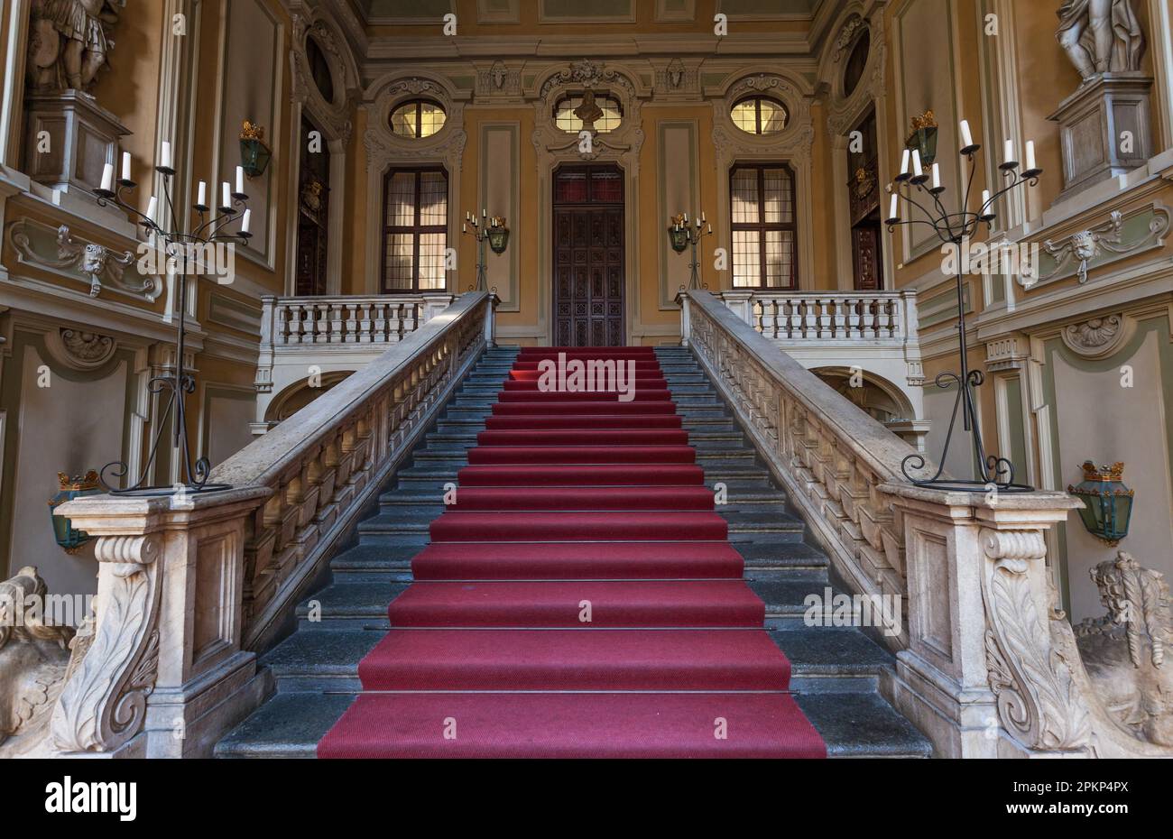 Red carpet for this Italian old palace entrance Stock Photo - Alamy