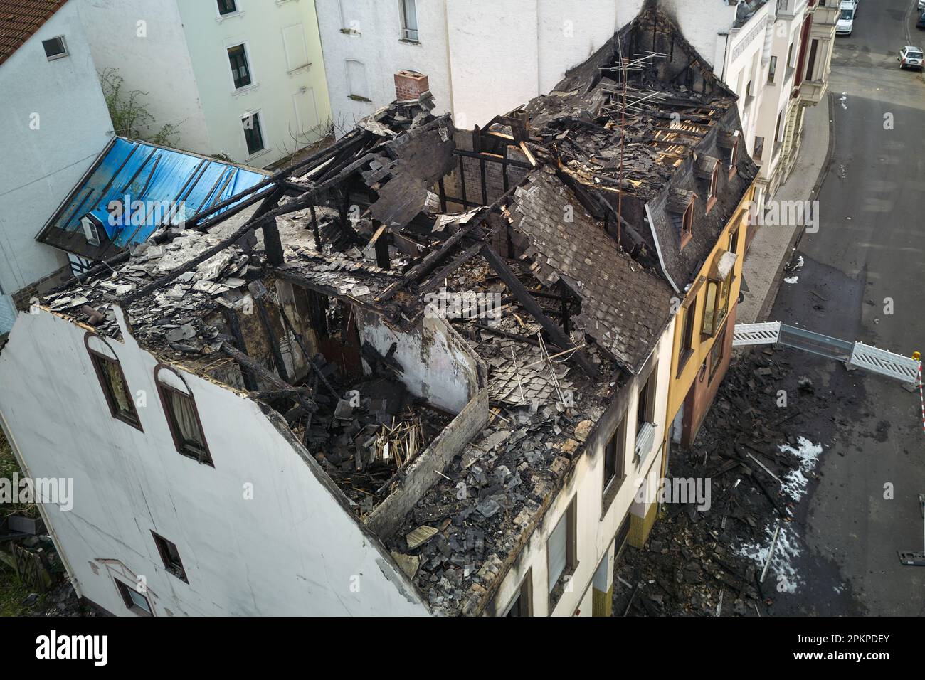 Koblenz, Germany. 03rd Apr, 2023. Two residential buildings in the Pfaffendorf district of Koblenz were totally destroyed after a fire. Two residents were rescued by the fire department and hospitalized. (Aerial photograph taken with a drone) Credit: Thomas Frey/dpa/Alamy Live News Stock Photo