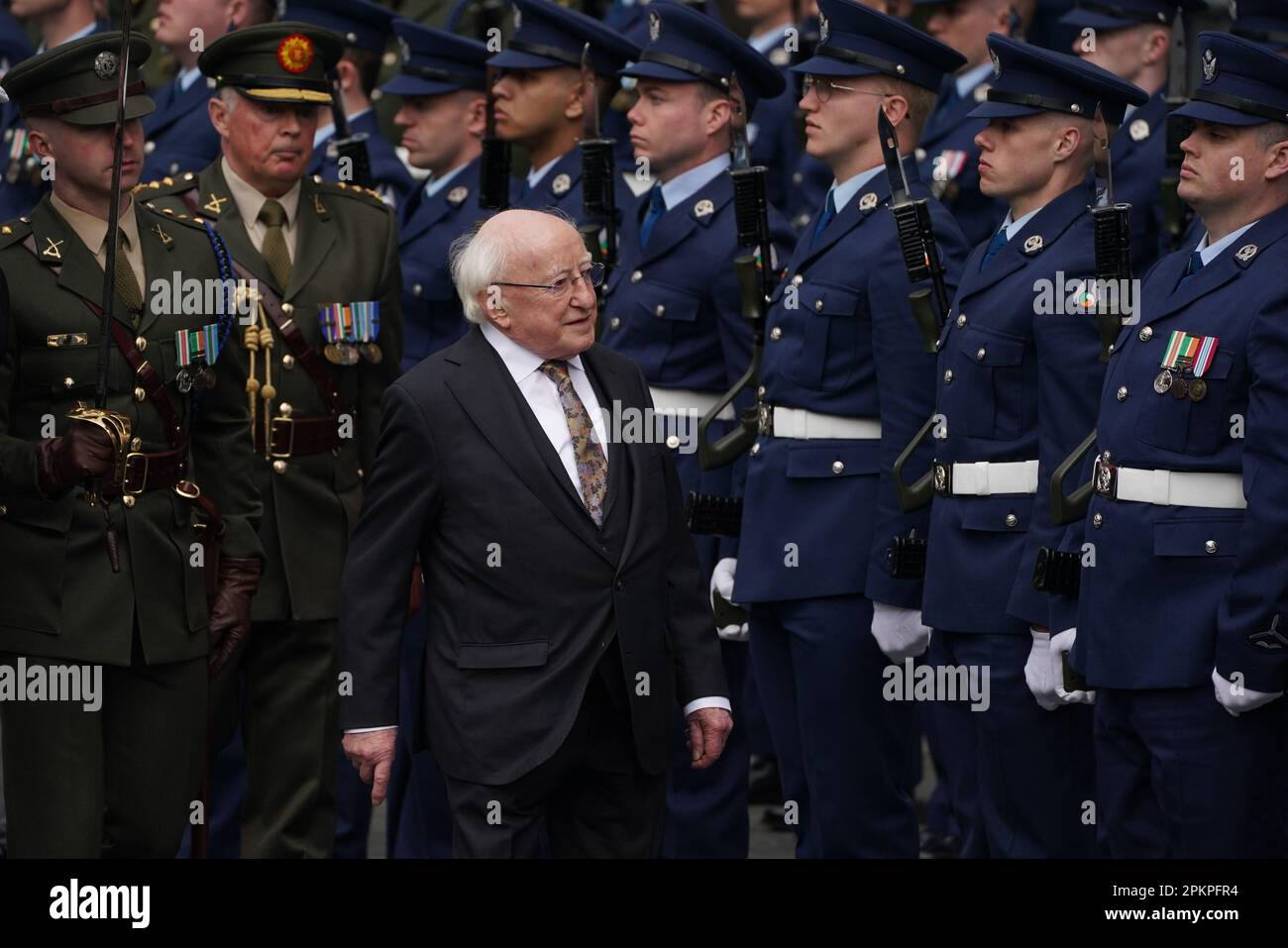 President Michael D Higgins inspects the guard of honour during a