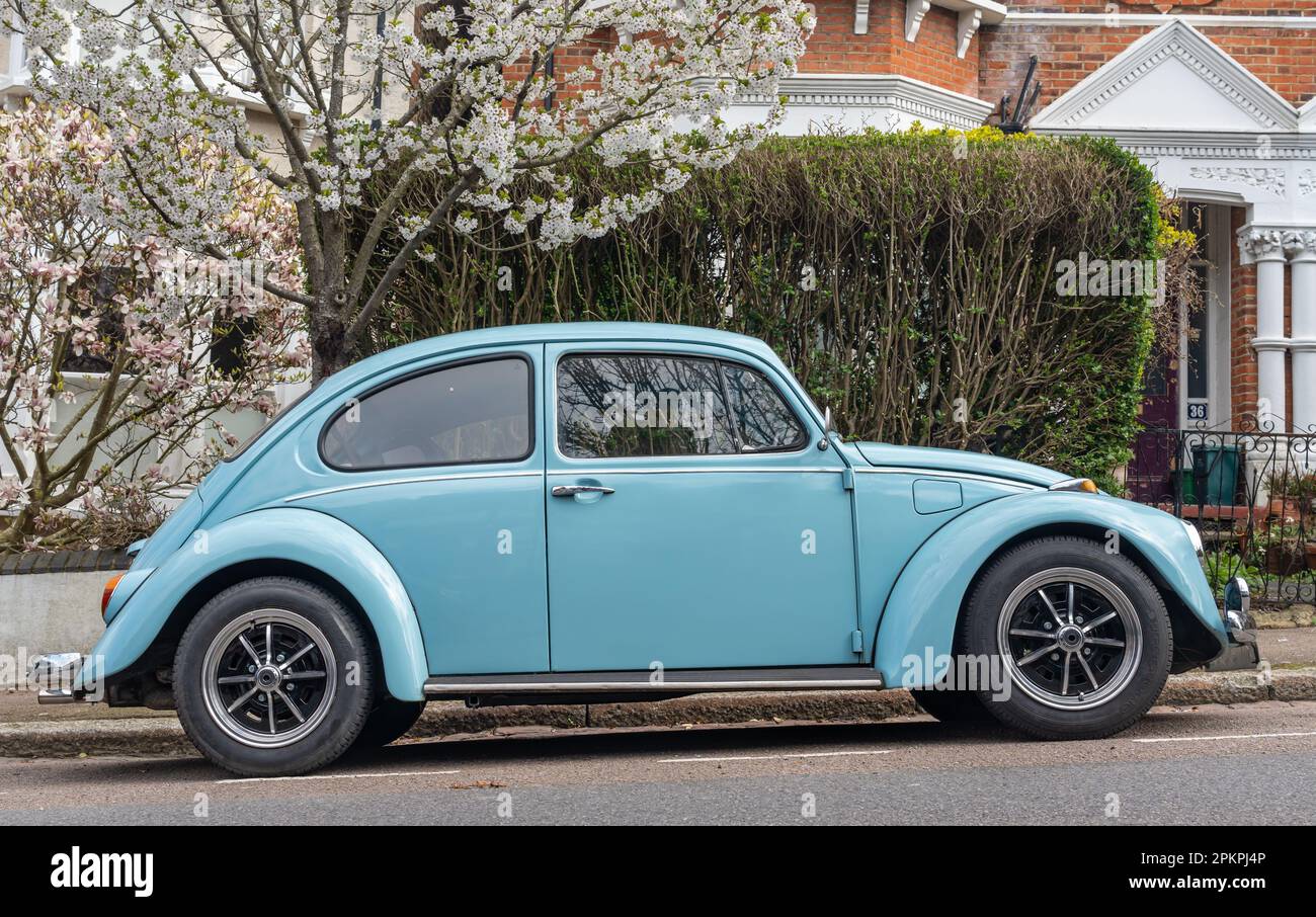 London, United Kingdom, 03.04.2023, A classic Volkswagen Beetle car in blue colour parked in the street Stock Photo