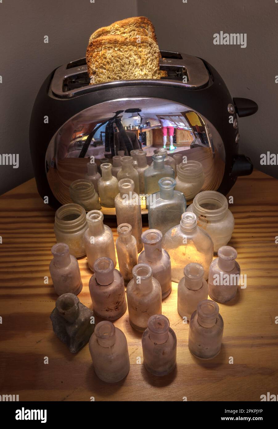 Toaster with old bottles Stock Photo Alamy