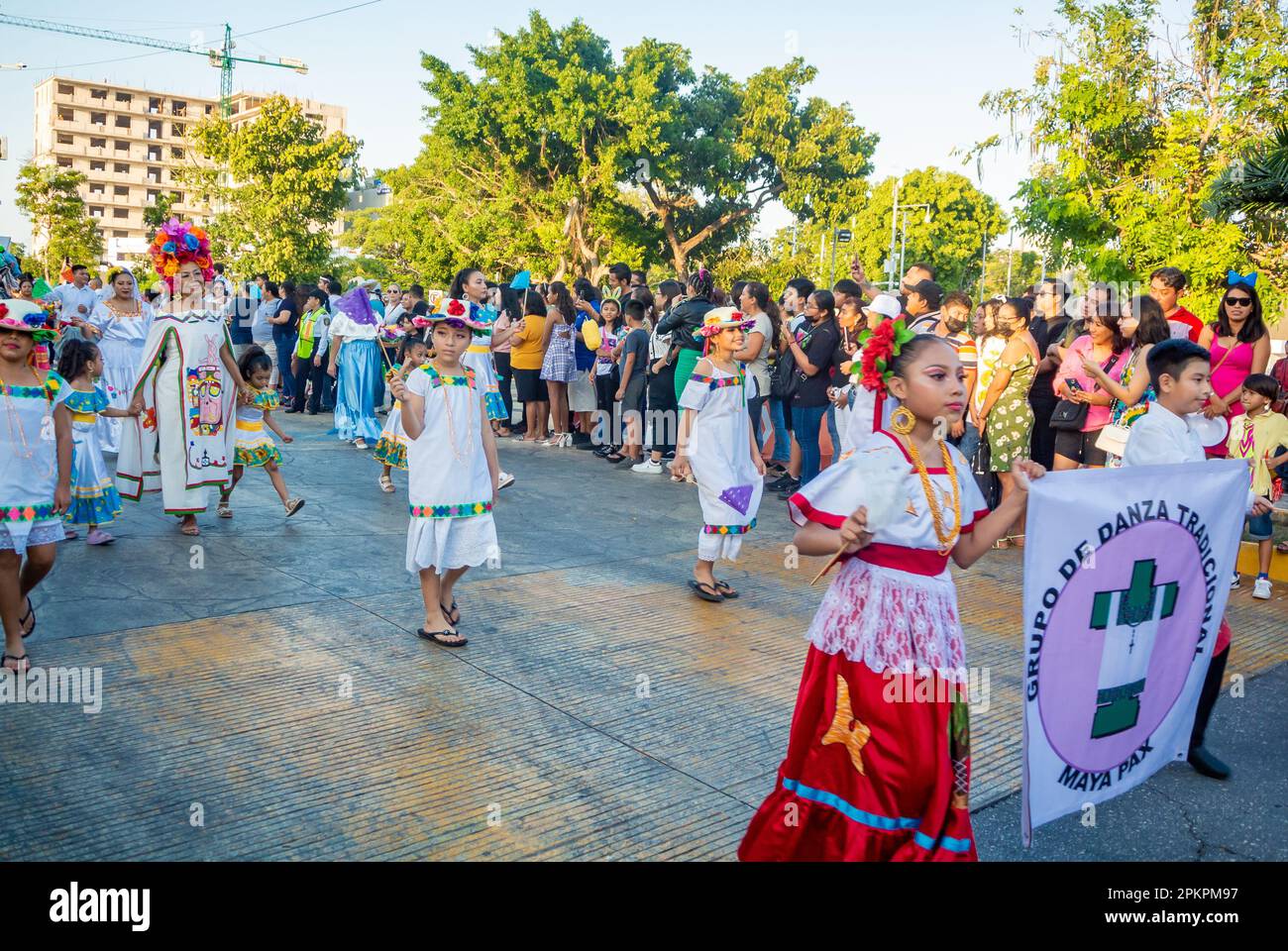 Cancun, Quintana Roo, Mexico, Mexican female walking at Cancun carnival 2023 with traditional clothes. Stock Photo