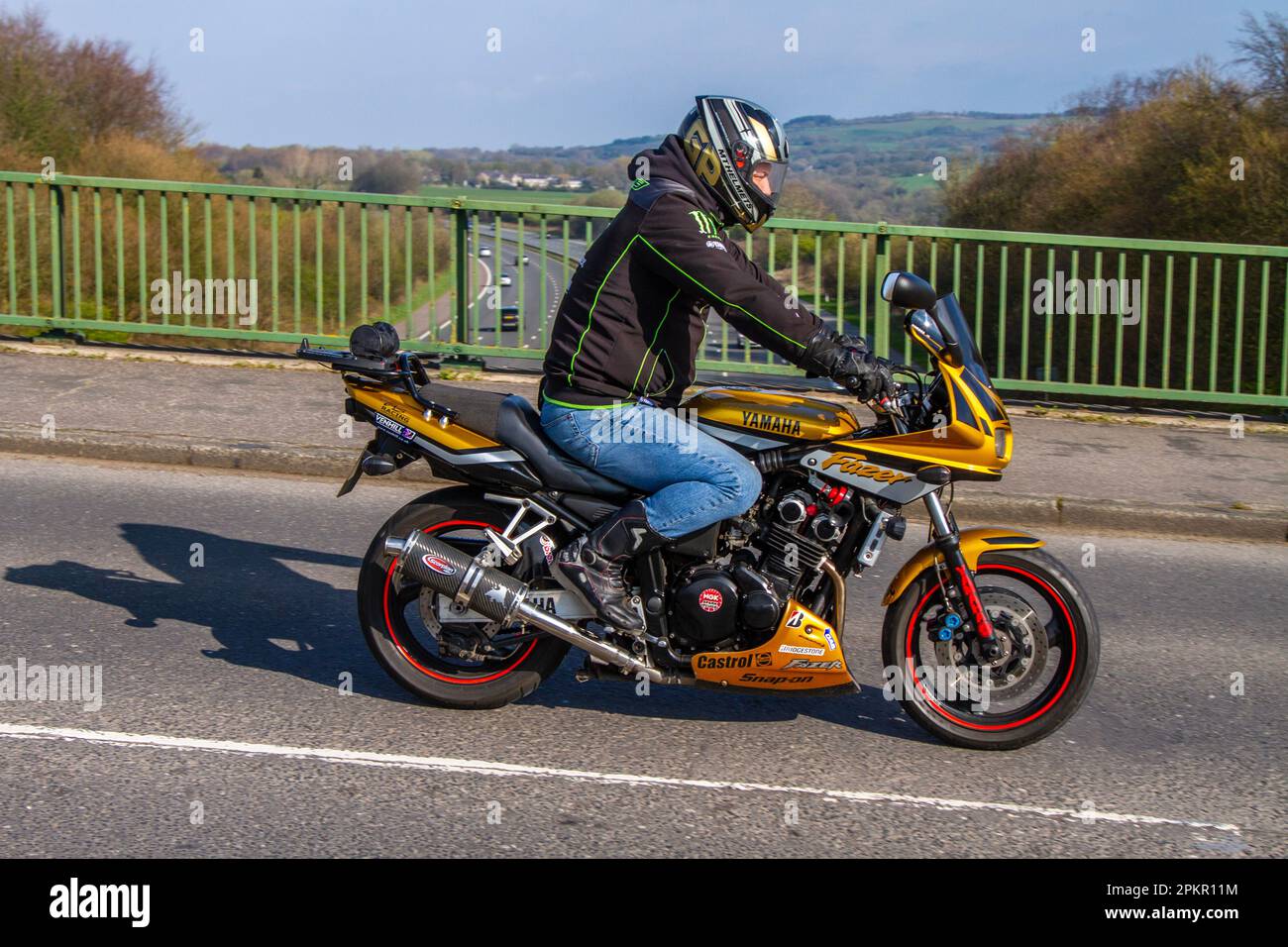 2002 Gold Yamaha Fzs 600 Inline Four, Sports Petrol 599 cc; crossing motorway bridge in Greater Manchester, UK Stock Photo